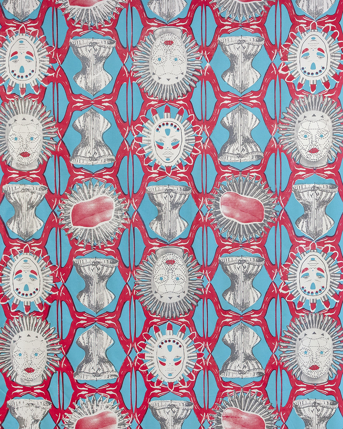 A vibrant repeating textile pattern in red, cyan, and off-white shows interlocking geometric motifs with stylized human faces featuring red lips and spiky halo-like hair, gray corset- or armor-like forms, and circular sunburst shapes with pink, organic-looking centers.